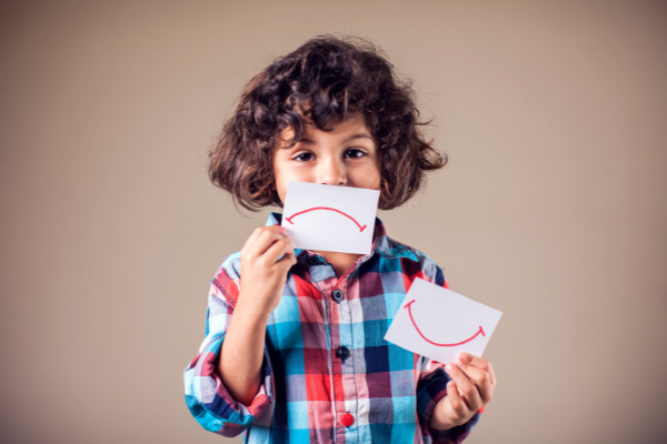 How to Teach Kids About Emotions | If you're looking for tips and activities to help you introduce emotions to your child - and to help teach emotional self-regulation - this post has lots of tips and ideas to help. Emotional intelligence is a difficult concept to teach to kids, but there are many tips and activities to make teaching these ideas easy - and fun! From social skills books and games, to songs and videos, you can use these at home and in the classroom.