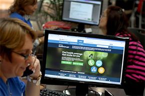 Mercy Cabrera, an insurance agent with Sunshine Life and Health Advisors, speaks on the phone with someone requesting information about an insurance policy under the Affordable Care Act.